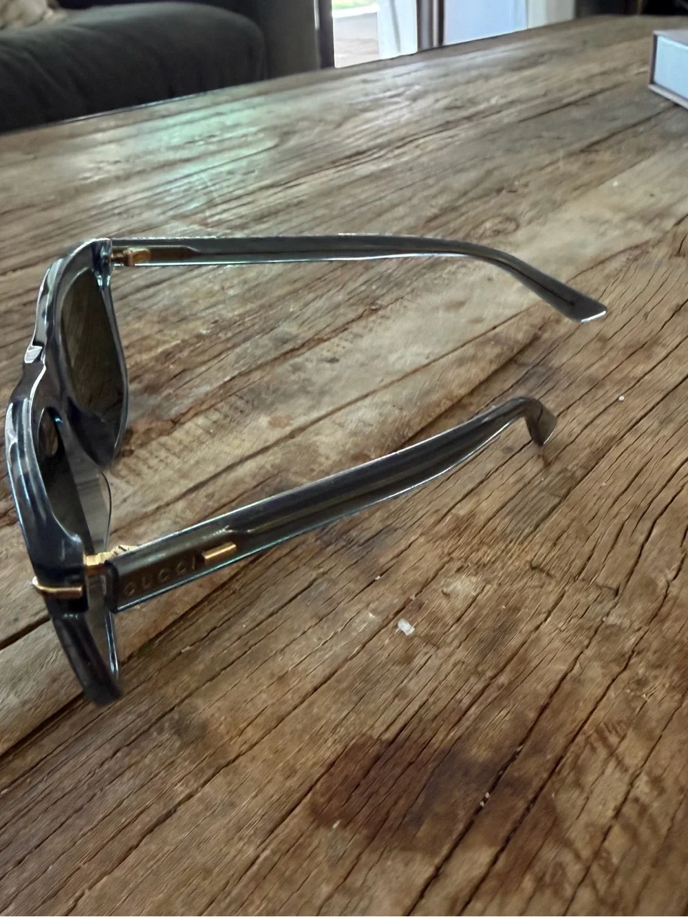 Gucci Transparent Gray Sunglasses with Dark Green Lenses